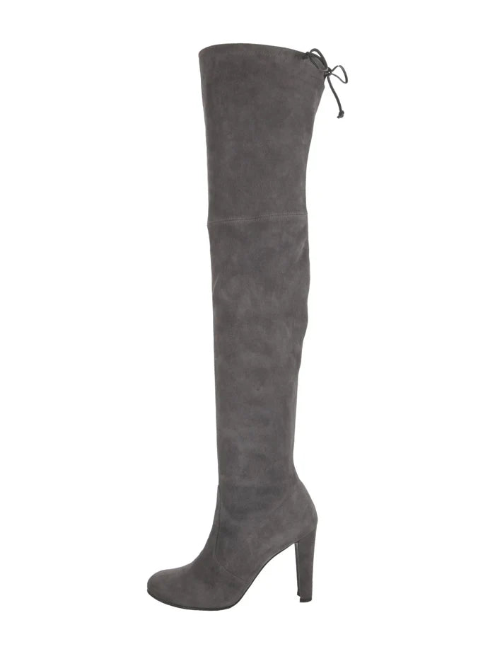 Stuart Weitzman suede boots in size 9 with a sleek design and knee-high style, shown on a plain background.