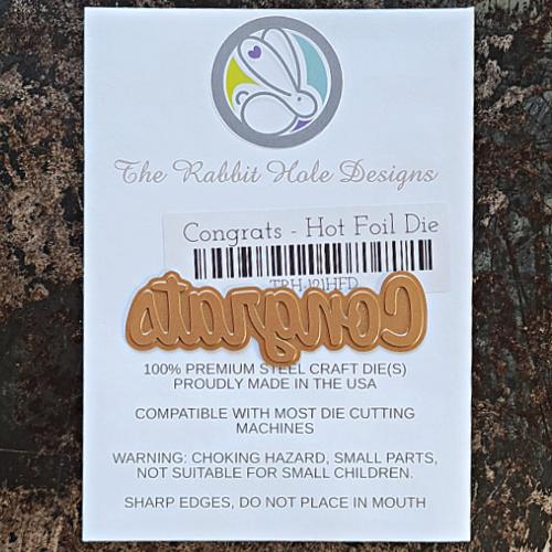 The Rabbit Hole Designs - Scripty Word Hot Foil Plate - Congrats. Create a stunning, letterpress feel to all your projects using our new hot foil dies! Designed to work in any standard hot foil system, be sure to follow the instructions in your manual for a standard hot foil plate. Made in the USA.  Coordinates with Congrats - Scripty 3x4 Stamp Set & Congrats - Scripty Word with Shadow Dies. Available at Embellish Away located in Bowmanville Ontario Canada.