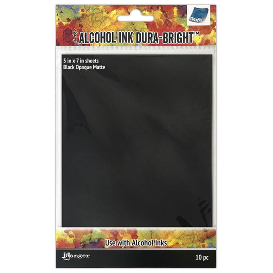 Tim Holtz - Alcohol Ink Dura-Lar 5"X7" - 10/Pkg - Black Opaque Matte. A versatile surface suited for permanent inks & mixed media techniques. Dura-Lar Black Opaque Matte 0.10 inch surface that is heat tolerant and non-absorbent. Available at Embellish Away located in Bowmanville Ontario Canada.
