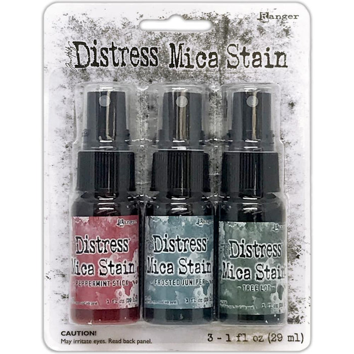 Tim Holtz - Distress Mica Stain Set - Holiday Set# 1.  This set includes 3 Holiday colours: Peppermint Stick, Frosted Juniper, Tree Lot. Limited supplies release. Available at Embellish Away located in Bowmanville Ontario Canada.