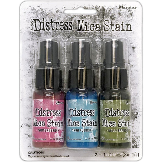Tim Holtz - Distress Mica Stain Set - Holiday Set# 2. This set includes 3 Holiday colours: Winterberry, Snow Flurries and Holiday Branch. Limited supplies release. Available at Embellish Away located in Bowmanville Ontario Canada.