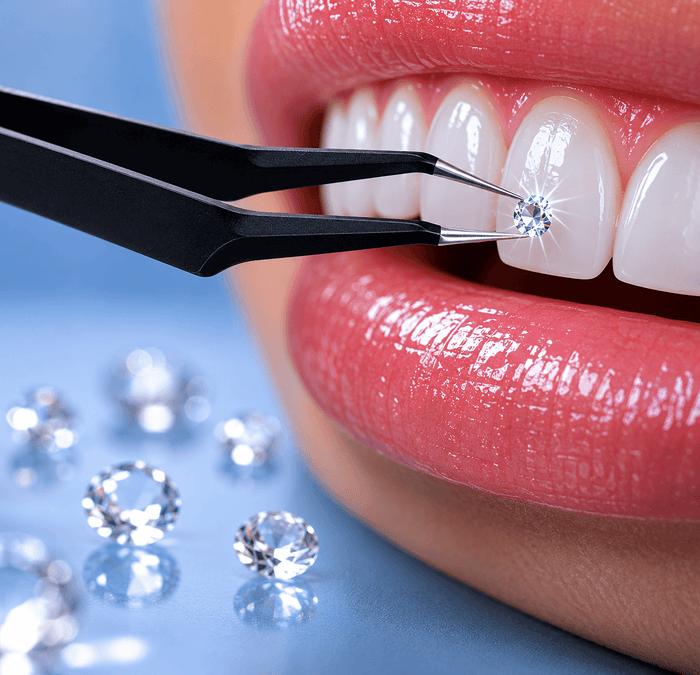 Diamond being placed into a woman's mouth using tooth gem tweezers.