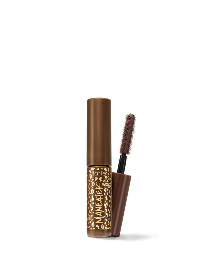 Brown mascara with brush on a white background