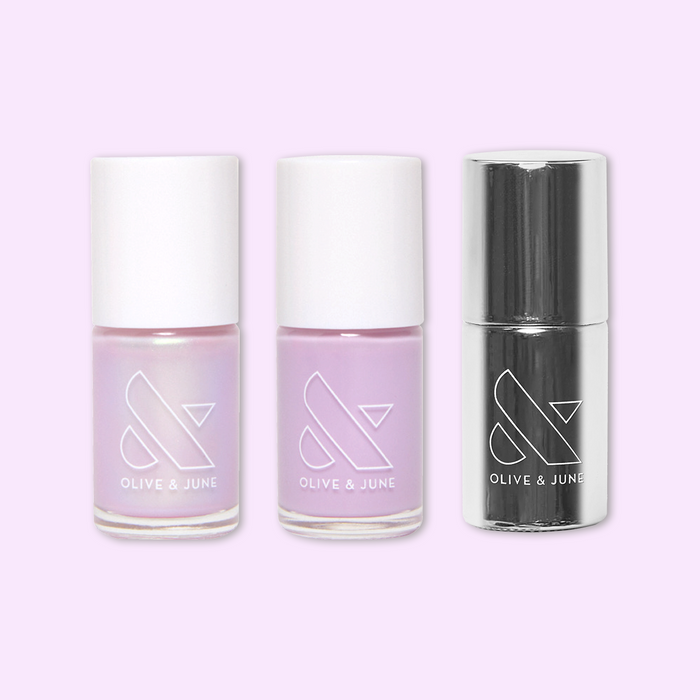 Violet Bliss nail polish set by Olive and June with lavender shades and super glossy top coat for at-home mani.