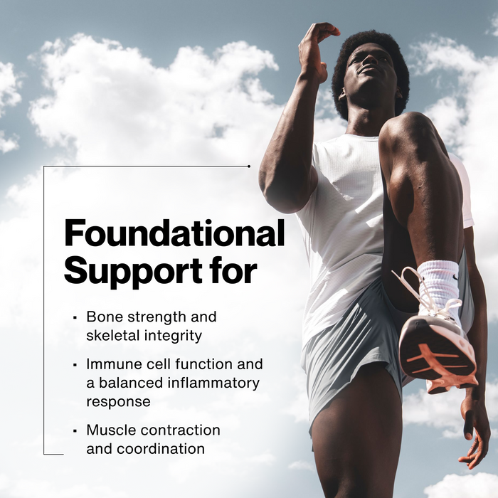 Photo of a male athlete in a white tank top stretching his leg upward against a cloudy blue sky. Text: "Foundational Support for" / "Bone strength and skeletal integrity" / "Immune cell function and a balanced inflammatory response" / "Muscle contraction and coordination."