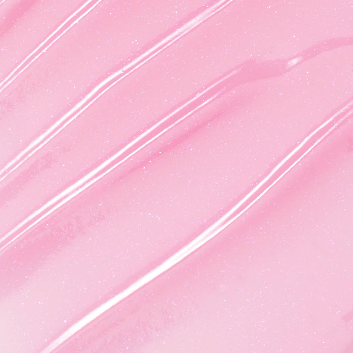 You're a Catch ColourPop Lip Mask swatch gliding in diagonal streaks, showing a sheer baby pink, glossy, micro-shimmer finish in a close-up texture shot.